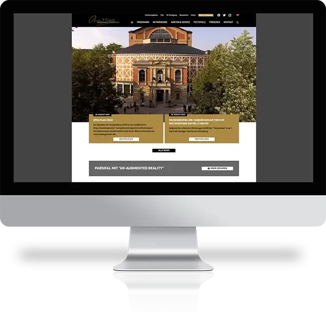Website der Bayreuther Festspiele auf einem Monitor